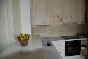 Romantic Apartment | Private kitchen | Full-sized fridge, microwave, oven, stovetop