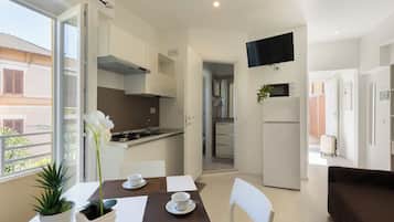 Appartamento Superior, terrazzo | Area soggiorno | TV a schermo piatto