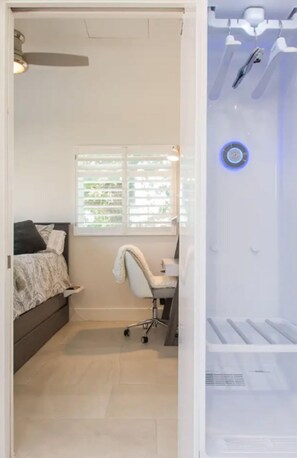 1 bedroom, desk, iron/ironing board, travel cot