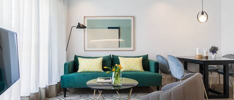 Apartment, 1 Bedroom | Living area | Smart TV