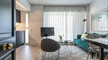 Apartment, 1 Bedroom | Living area | Smart TV