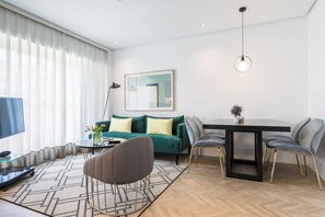 Apartment, 1 Bedroom | Living area | Smart TV
