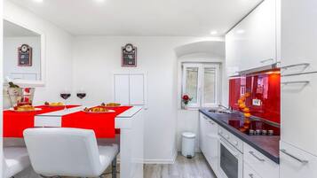 Apartment, 1 Schlafzimmer | Eigene Küche | Kühlschrank, Mikrowelle, Ofen, Herdplatte