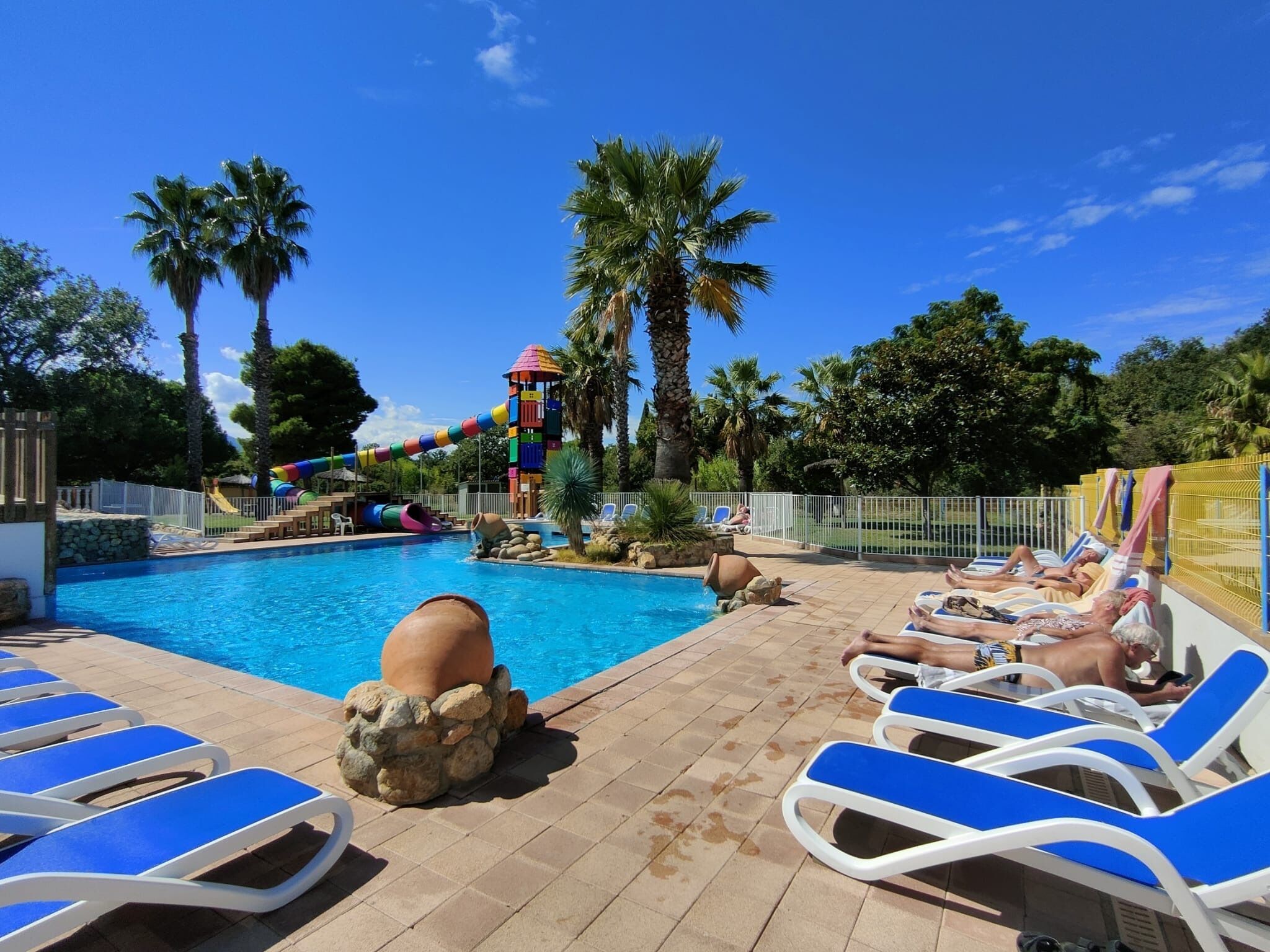 Seasonal outdoor pool, pool umbrellas, pool loungers