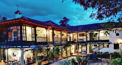 Posada Bie is a colonial style house, surrounded by 6000 meters of gardens