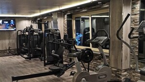 A gym with various exercise equipment, including treadmills and weight machines. - Dolphin Ras Elbar (Damietta)