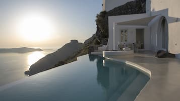 Outdoor pool, pool umbrellas, pool loungers