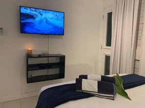 Comfort Apartment | Blackout drapes, iron/ironing board, free WiFi, bed sheets