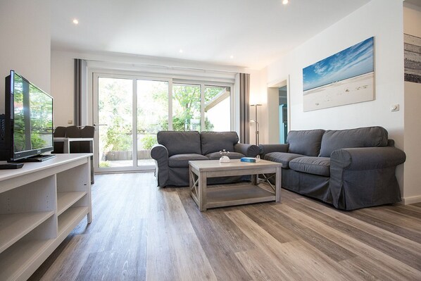 Appartement (Ebbe) | Woonkamer | Flatscreentelevisie