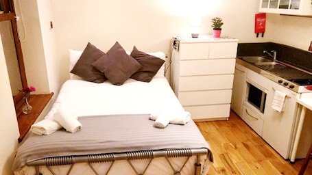 1 habitación, tabla de planchar con plancha y wifi gratis