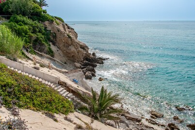 Luxury villa with its own swimming pool, directly by the sea, stairs to the see.