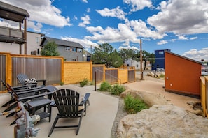 A patio area with outdoor furniture and a view of the neighborhood. - Buena Vista Home w/ Mtn Views, Walk to Main St (Buena Vista)