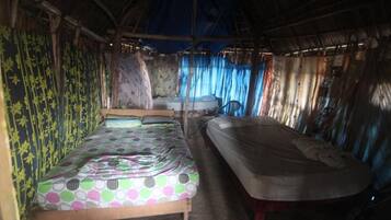 Cabana básico, vista parcial para o oceano | Roupa de cama