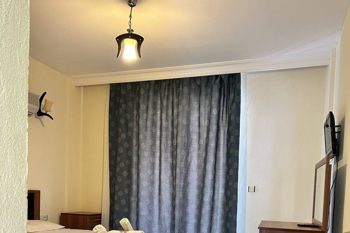 Standard Triple Room | Desk, iron/ironing board (on request), free WiFi, bed sheets