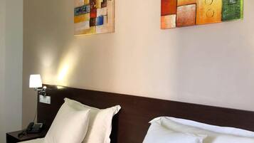 Matelas Tempur-Pedic, minibar, coffres-forts dans les chambres