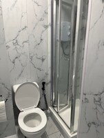 Shower, free toiletries, hair dryer, towels