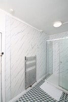 Shower, free toiletries, hair dryer, towels