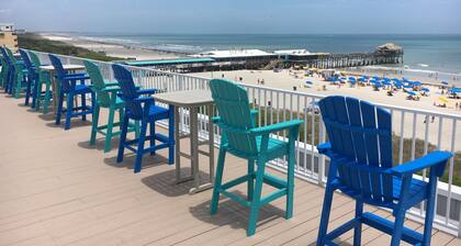 Sunny Shores Retreat: Pool, Balcony & Steps to the Ocean!