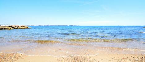 On the beach, sun loungers