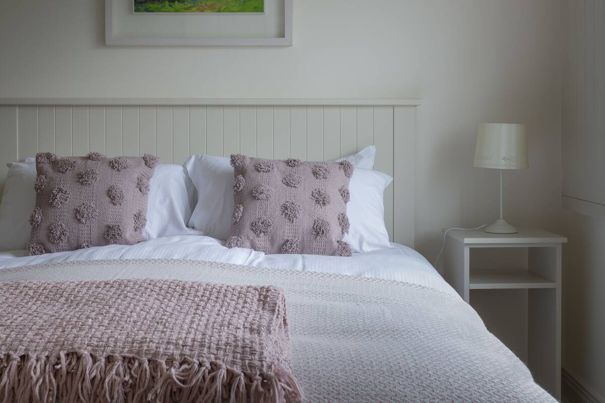 Premium bedding, down duvets, memory-foam beds, blackout curtains