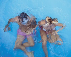 Seasonal outdoor pool, open 8:00 AM to midnight, pool umbrellas