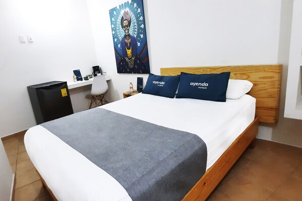 Desk, blackout curtains, free WiFi, bed sheets