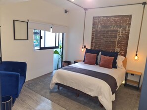 Desk, blackout curtains, free WiFi, bed sheets