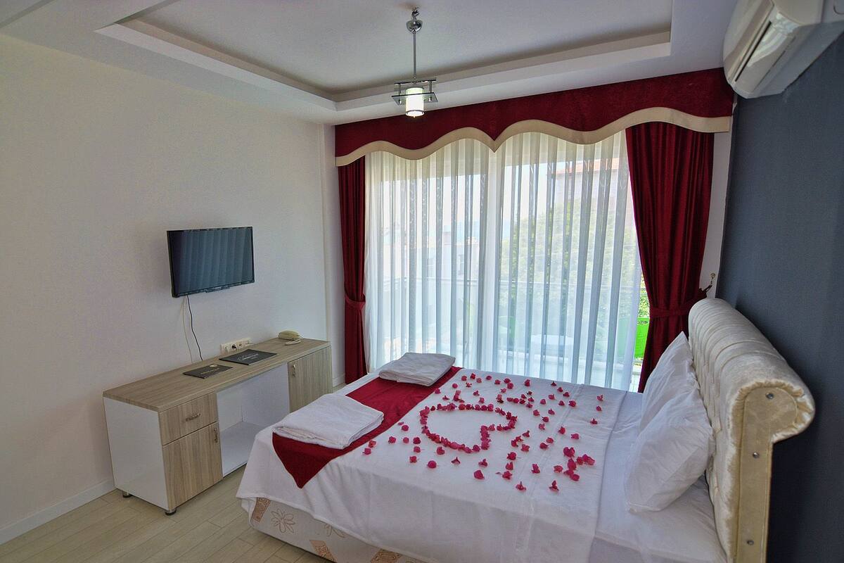 Standard Double Room | Minibar (some free items), in-room safe, iron/ironing board (on request)