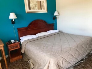 Tabla de planchar con plancha, wifi gratis y ropa de cama 