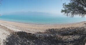 On the beach, sun-loungers - Christopoulos Villas (Aigialeia)