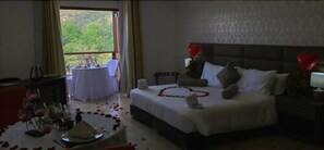 Deluxe Suite | Minibar, in-room safe, desk, blackout curtains - Hotel Majam's Resort (San Gil)