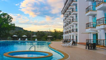 2 outdoor pools, open 9:00 AM to 9:30 PM, free cabanas, pool umbrellas