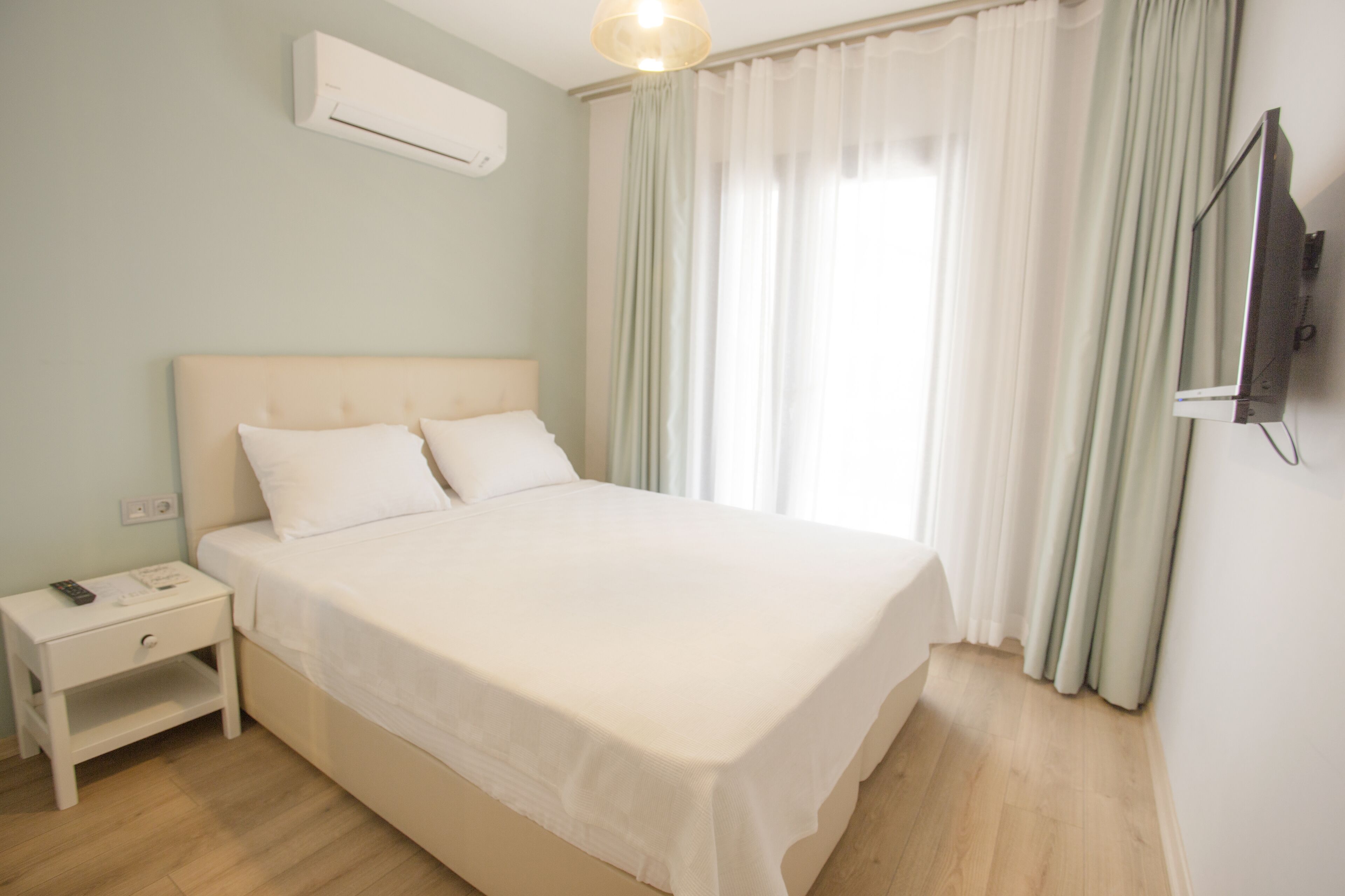 Standard Double Room, Partial Sea View | 1 bedroom, minibar, blackout drapes, free WiFi