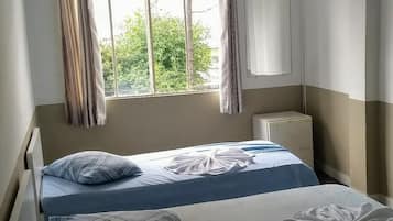 Desk, blackout curtains, free WiFi, bed sheets