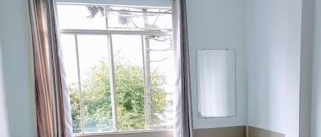 Desk, blackout drapes, free WiFi, bed sheets