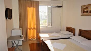 Standard Quadruple Room, Balcony | 1 bedroom, free WiFi, bed sheets
