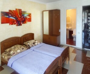 Phòng dành cho gia đình, 2 phòng ngủ, ban công | Truy cập Internet không dây miễn phí, bộ trải giường 