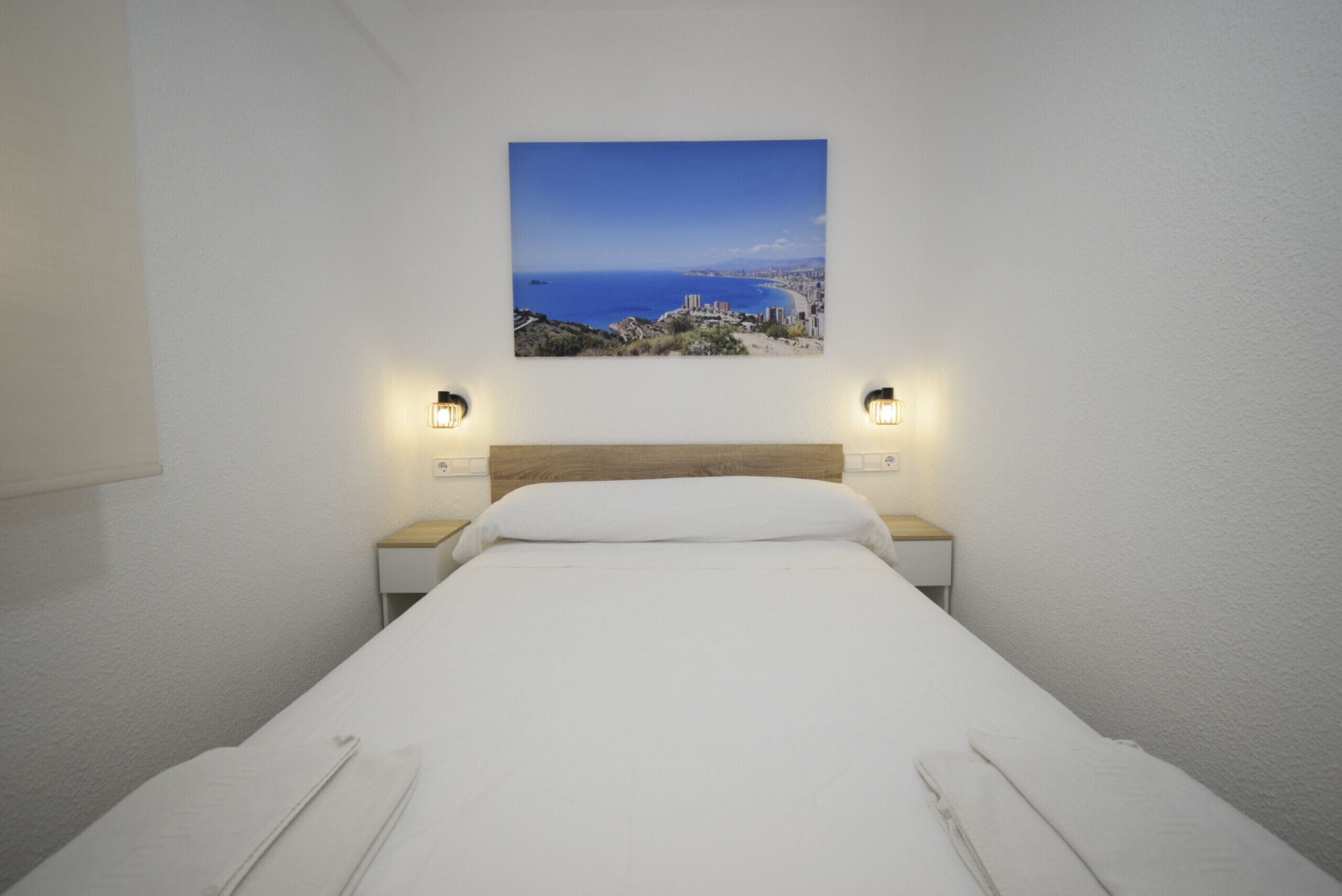 4 slaapkamers, een strijkplank/strijkijzer, beddengoed