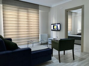 Appartement, 1 chambre | Coin séjour