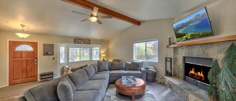 Télévision, cheminée, baby-foot