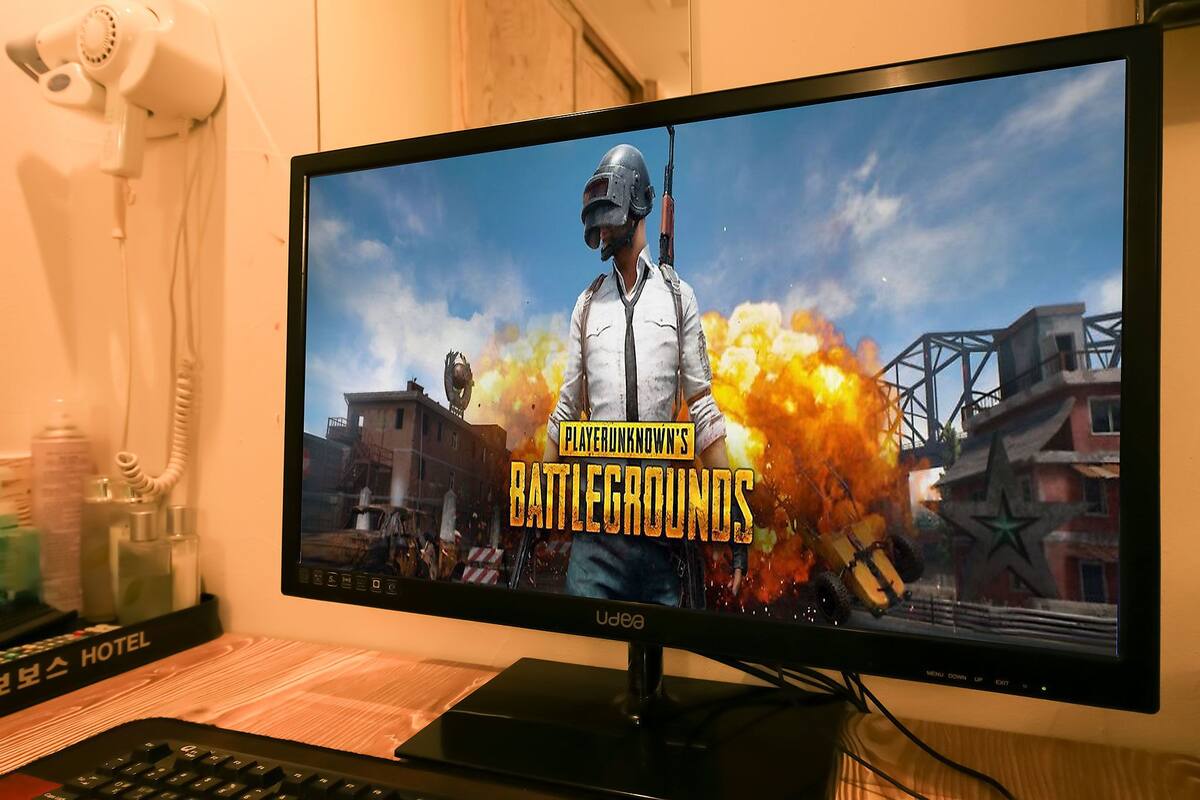 A computer monitor displaying a video game with the title "PlayerUnknown's Battlegrounds".