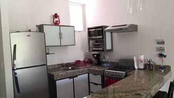 Fridge, microwave, coffee/tea maker, toaster