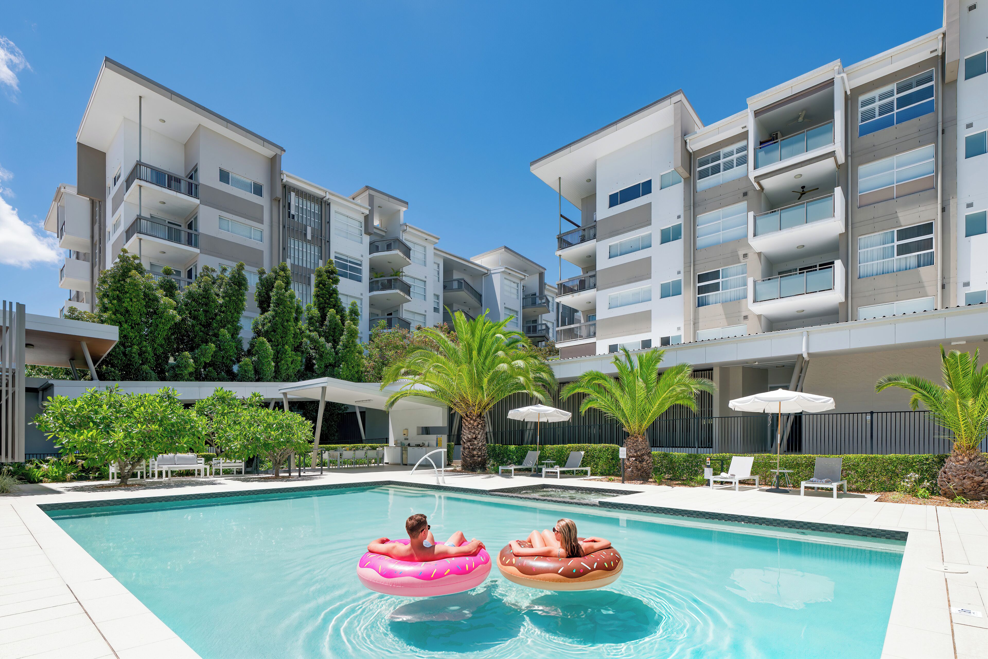 Outdoor pool, pool umbrellas, pool loungers