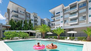 Outdoor pool, pool umbrellas, pool loungers