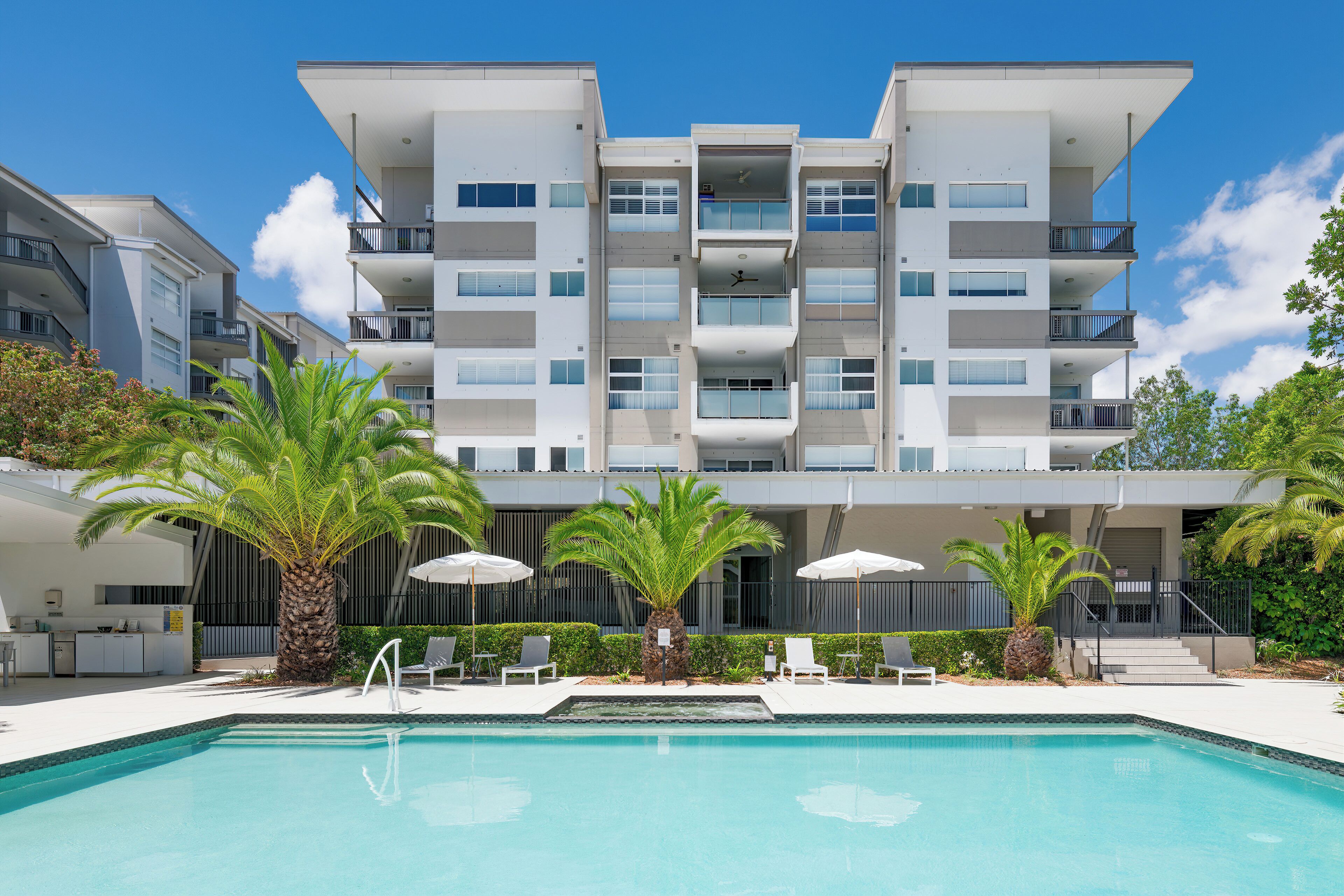 Outdoor pool, pool umbrellas, pool loungers