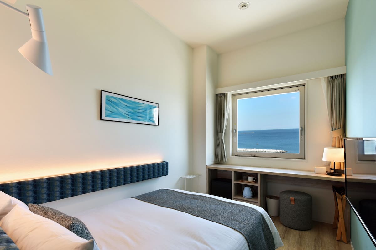 Doppelzimmer, Meerblick | Minibar, Zimmersafe, kostenloses WLAN