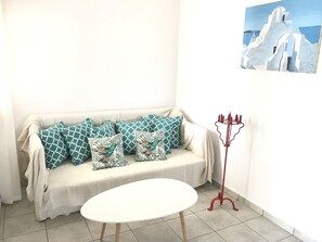 Apartamento panorâmico, vista para o mar | Sala de estar