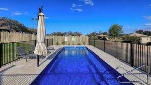 Seasonal outdoor pool, pool umbrellas, pool loungers