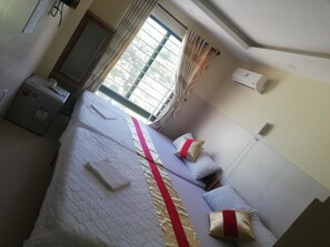 Deluxe Quadruple Room, Sea View | Minibar, in-room safe, desk, free WiFi - Thu Duc Hotel (Ho Chi Minh City)