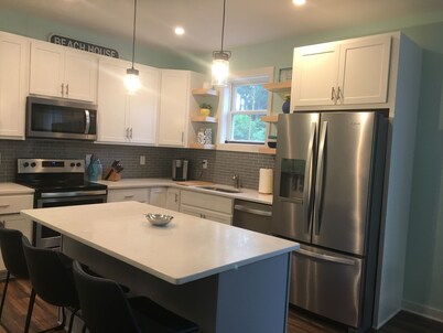 Walk to the beach!  Great modern home with spring and early summer availability!